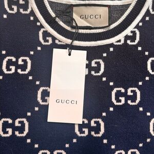 Brand new, WITH TAGS Gucci short sleeved G sweater!